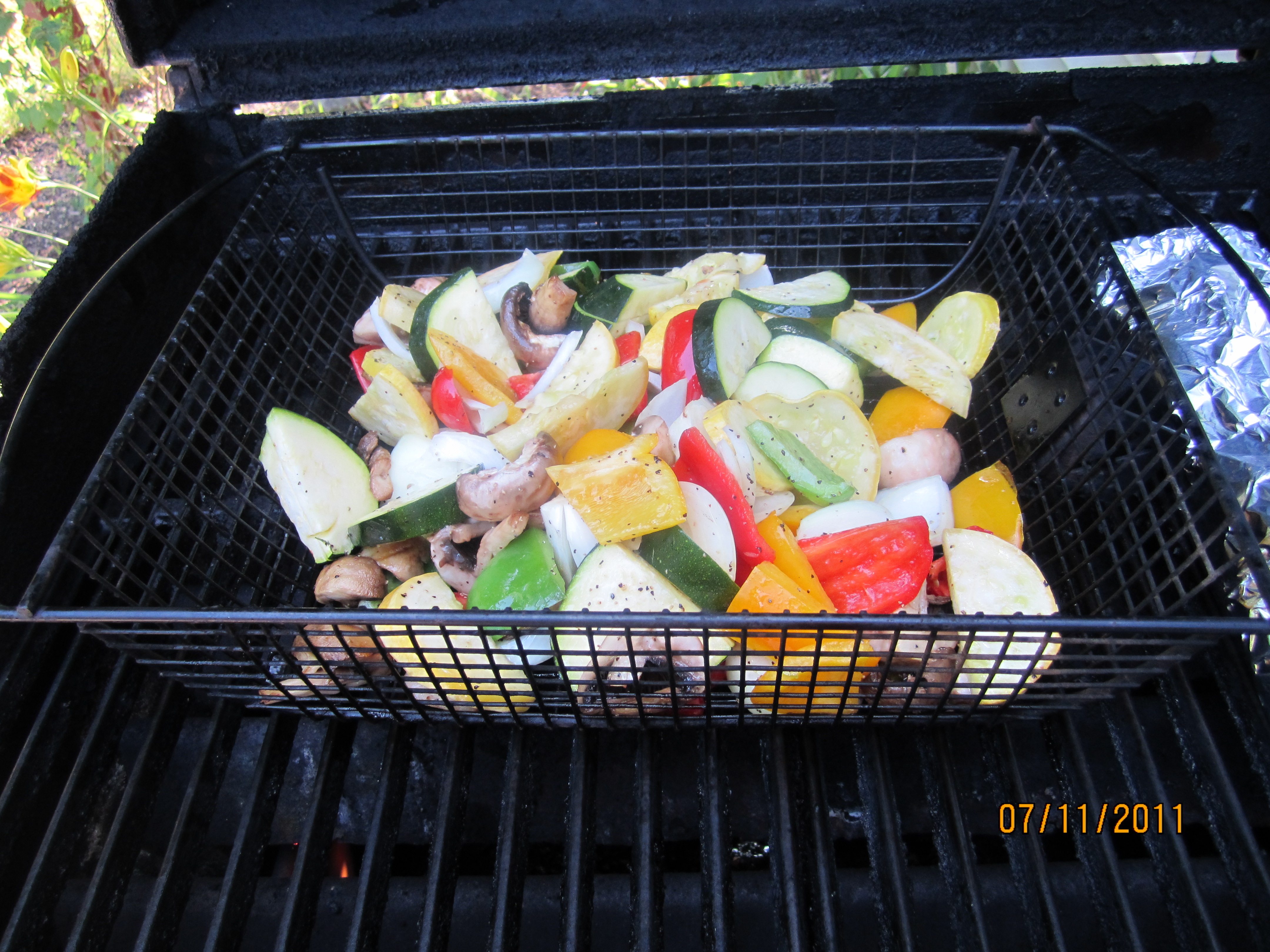 How do you cook vegetables in a grill basket?